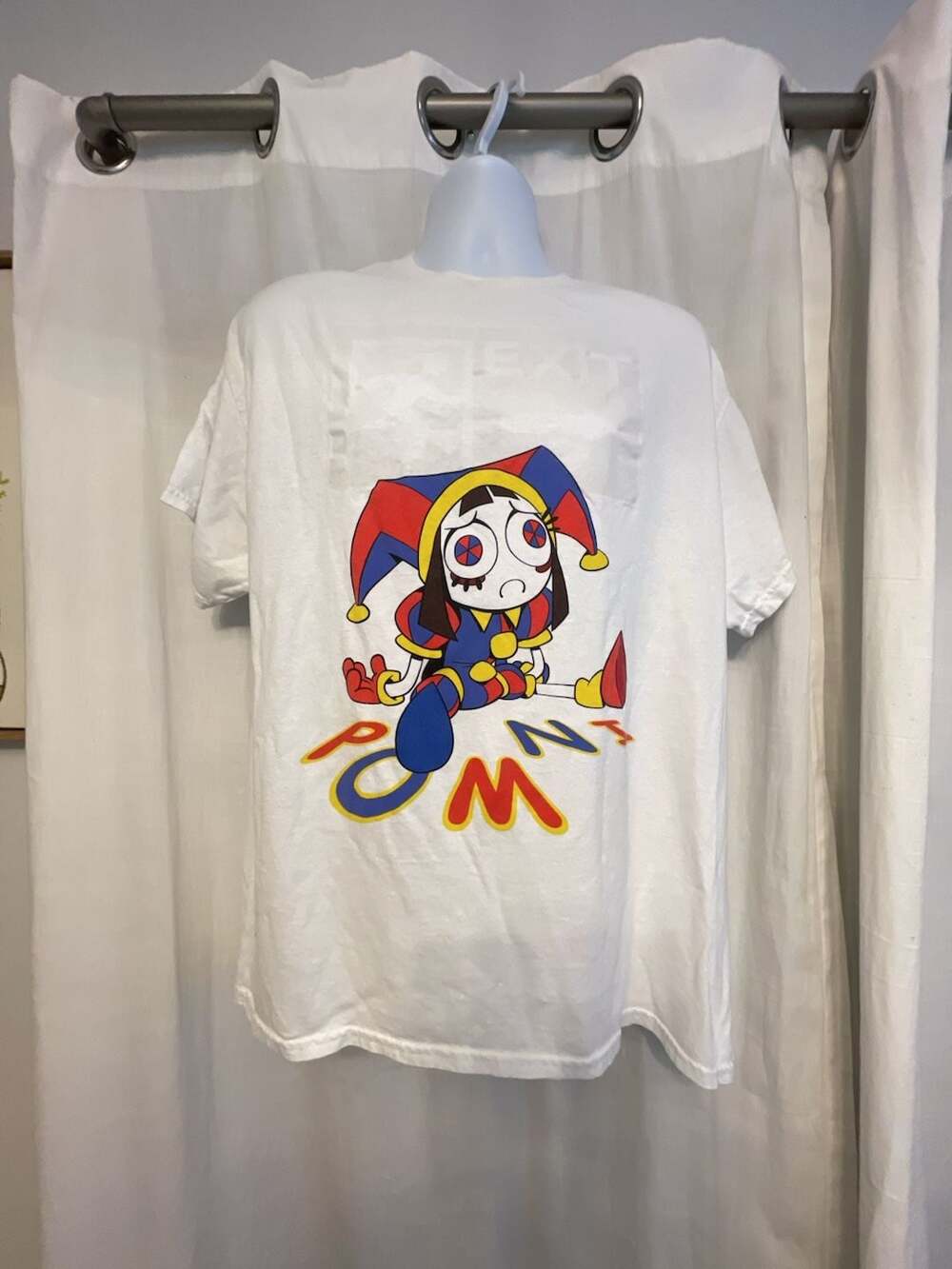 The Amazing Digital Circus Pomni Graphic White T-Shirt
XL
100% cotton